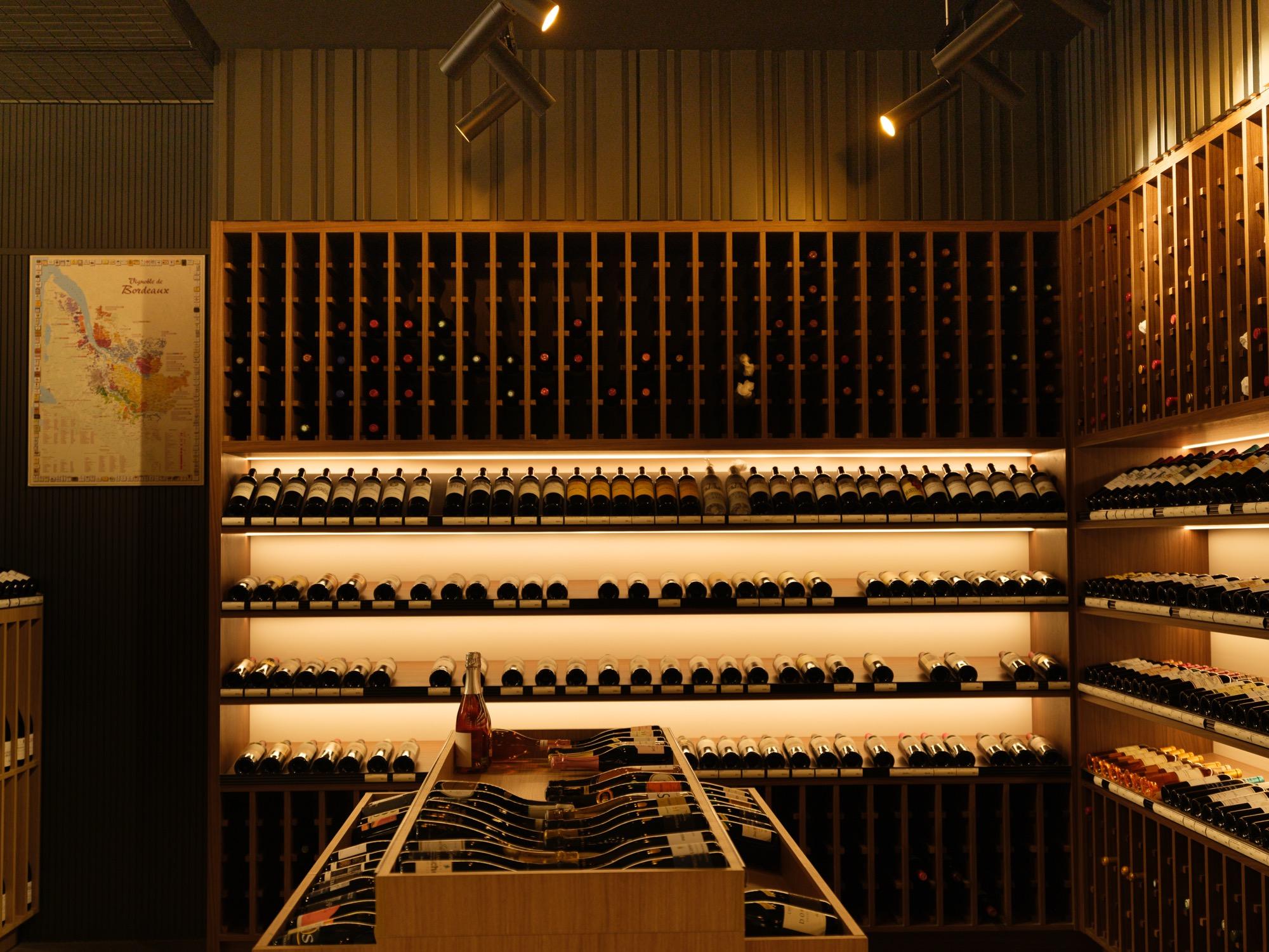 The cellar room in our Calgary shop, lined with aging bottles